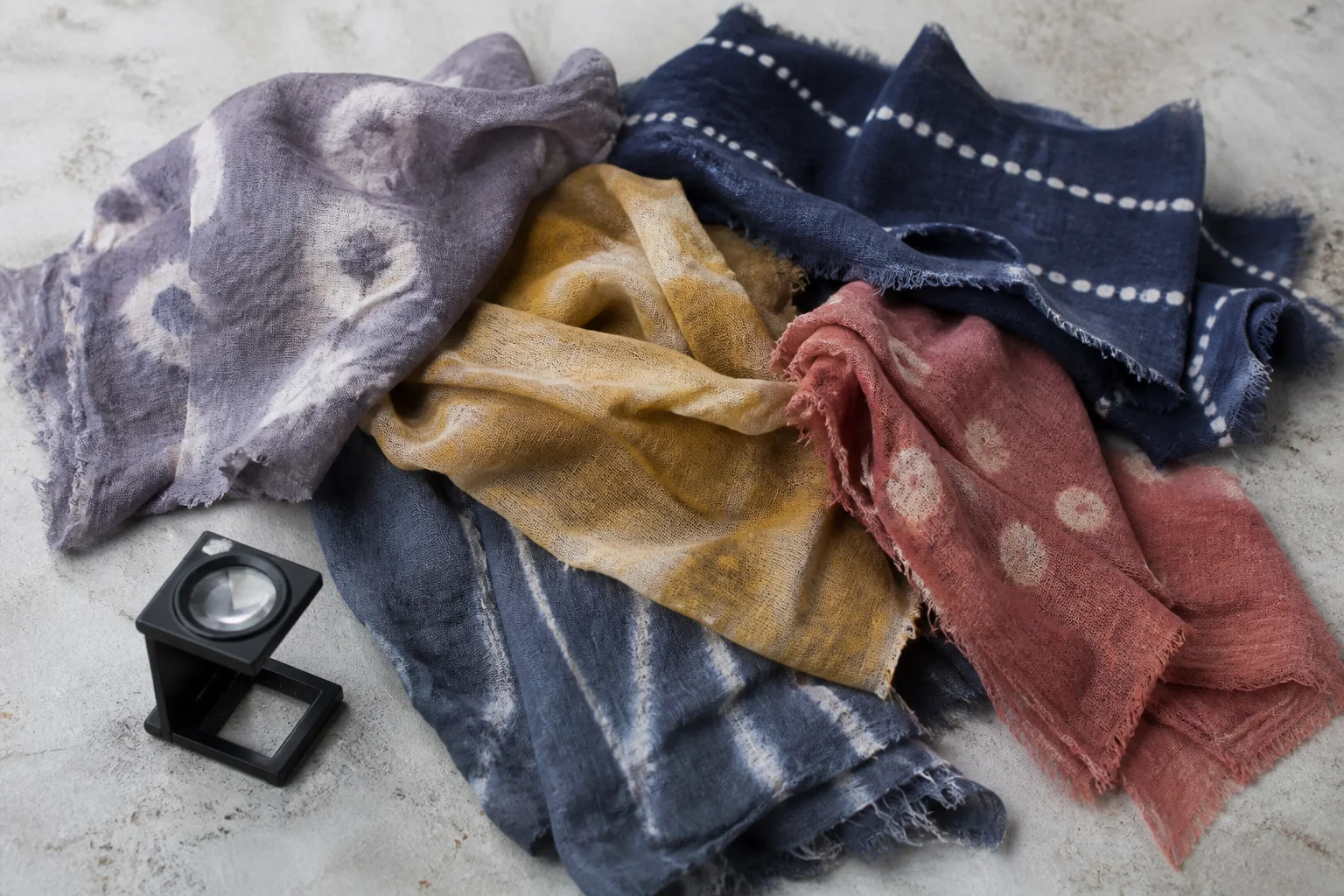 Mixed hand-dyed scarf samples with different edges and resist marks